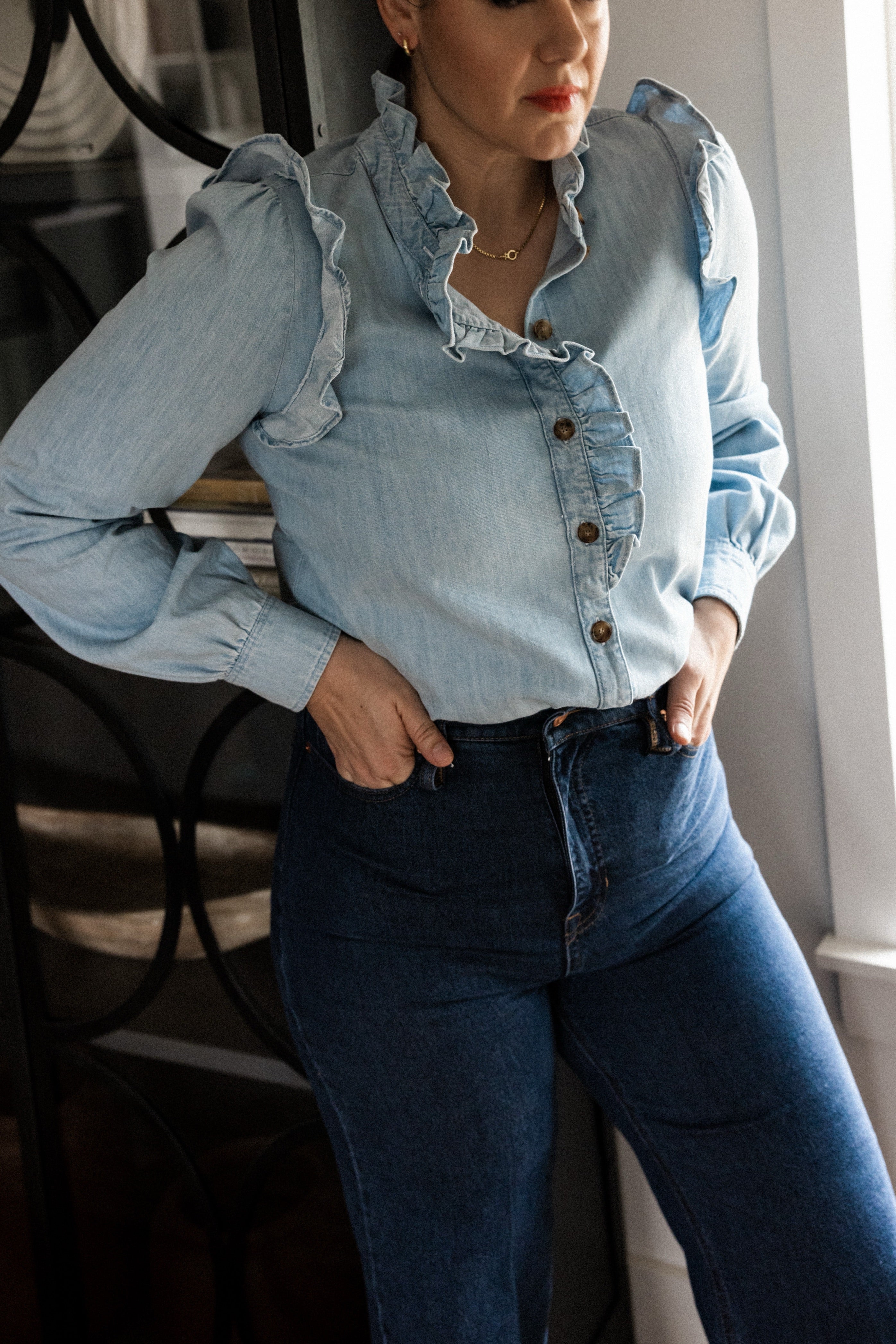 Light Wash Denim Ruffle Blouse