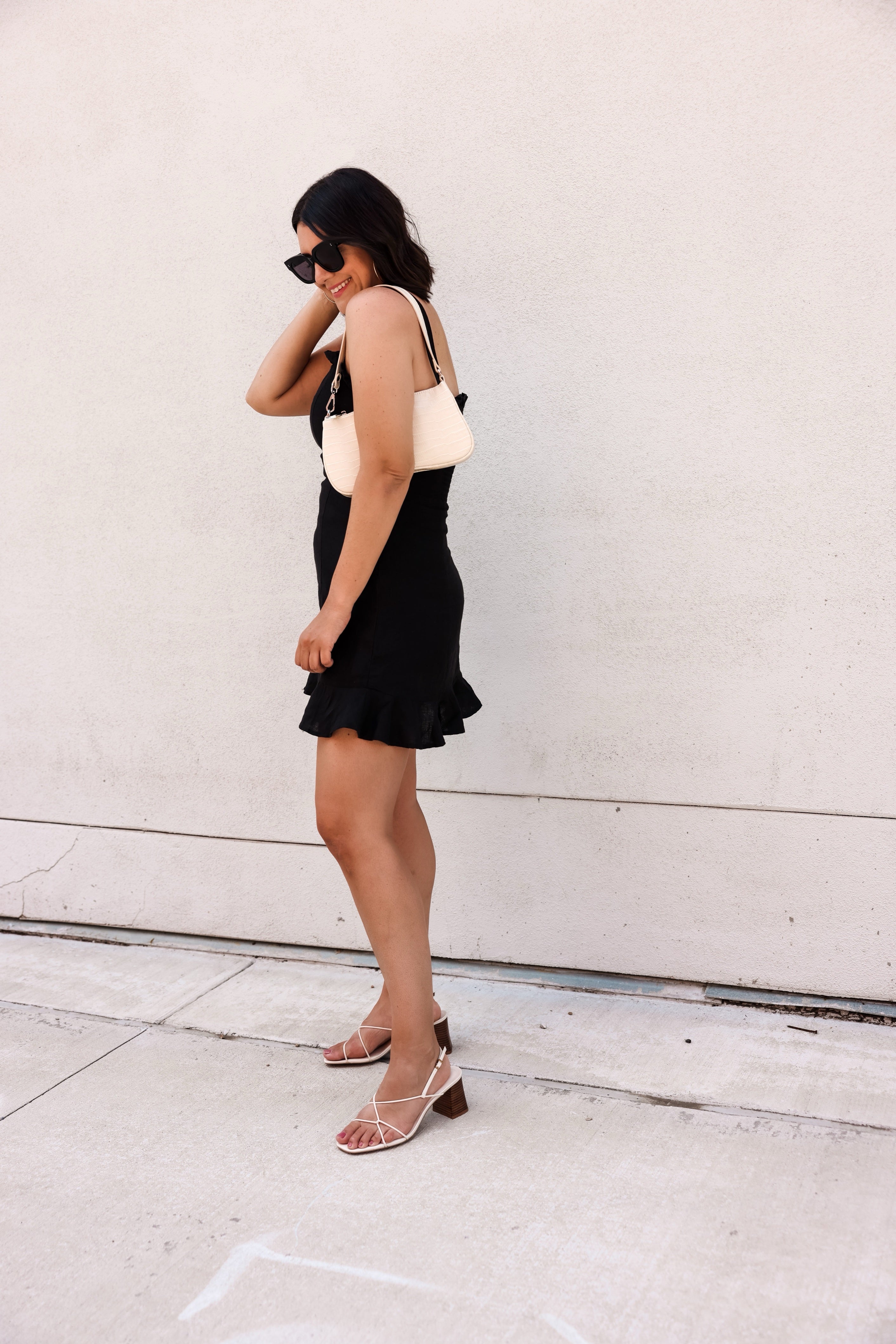 Leather heeled strappy sandals in off-white